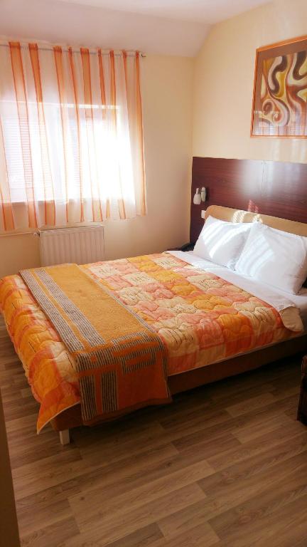 Postel nebo postele na pokoji v ubytování Hotel Čile