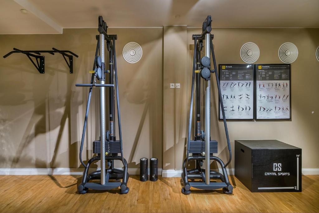 ADELANTE Boutique Hotelにあるフィットネスセンターまたはフィットネス設備