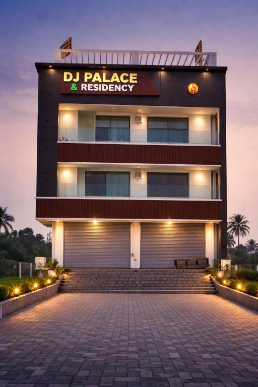 a building with a sign that reads d palace and residency at DJ Palace and Residency in Tiruvannāmalai