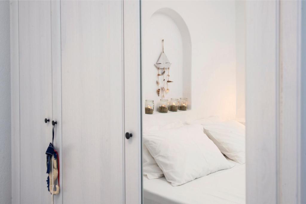 Posteľ alebo postele v izbe v ubytovaní Cleopatra Seaside Homes, Logaras, Paros