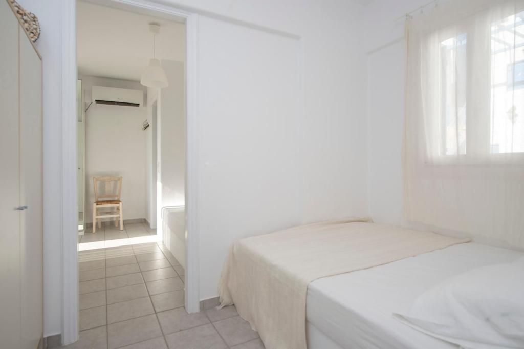 Posteľ alebo postele v izbe v ubytovaní Cleopatra Seaside Homes, Logaras, Paros