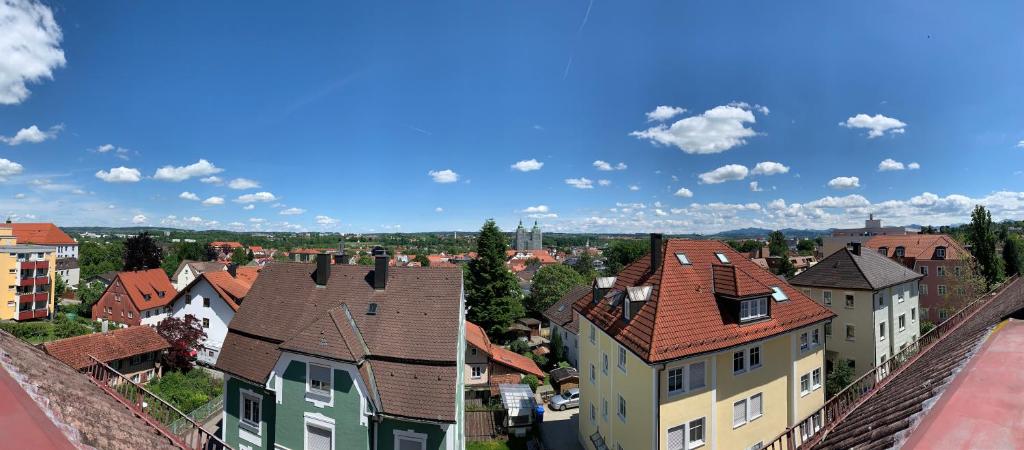 a view of a town with houses and buildings at Über den Dächern Kemptens mit Panoramablick in Kempten