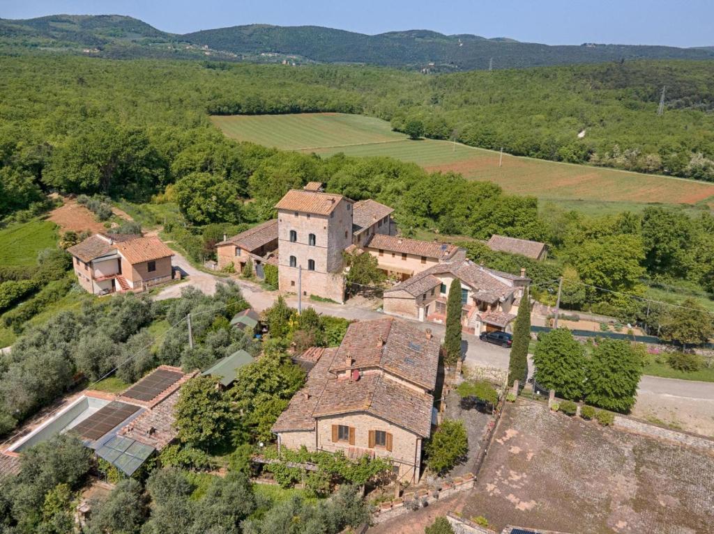 an aerial view of a estate with a house at Dimora storica Torre dei Petricci 12 in Sovicille