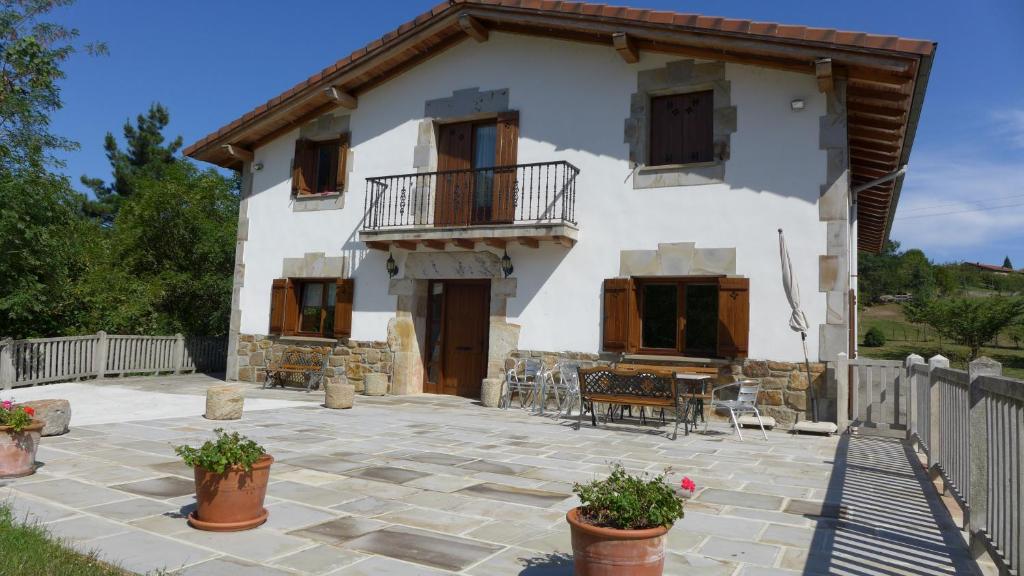 a house with a patio in front of it at Arregi2 in Oñati