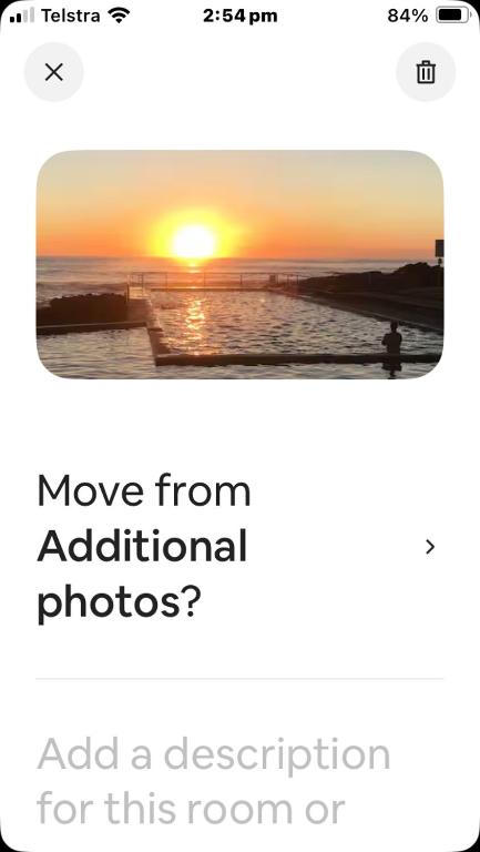 a screenshot of a cell phone of a person watching the sunset at Beach house in Hallidays Point
