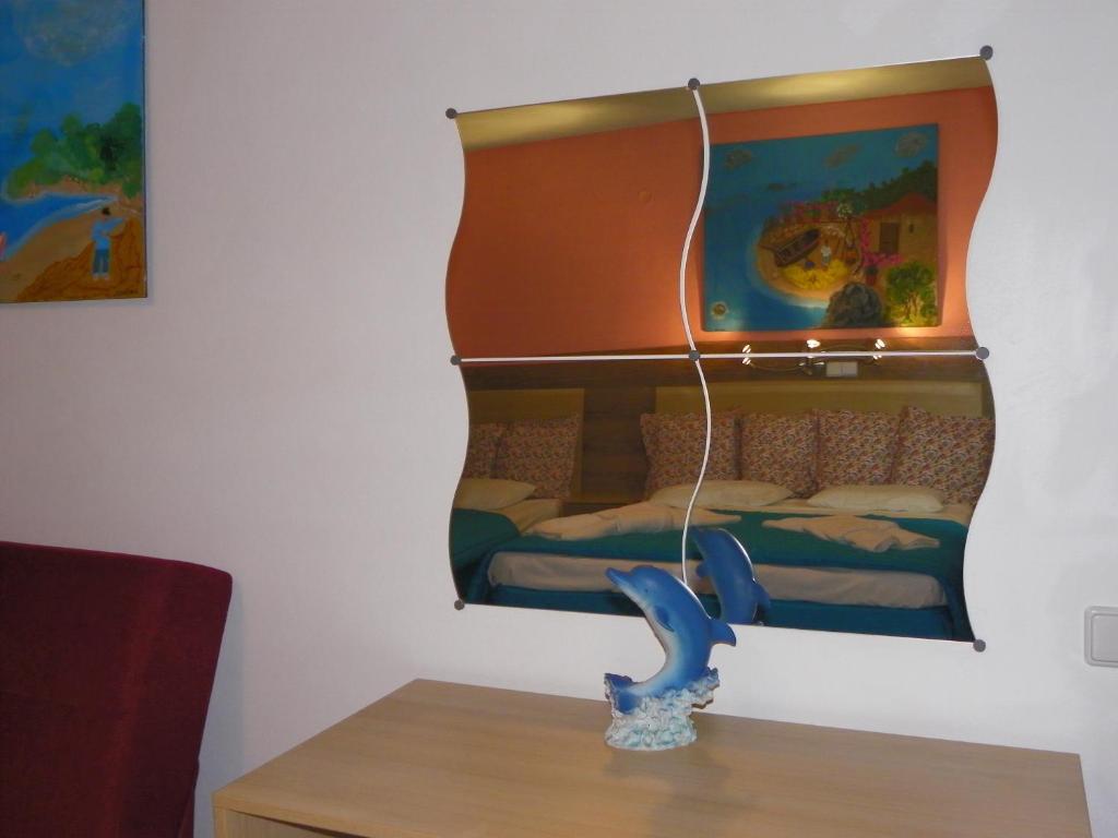 Letto o letti in una camera di Mirabelle Hotel