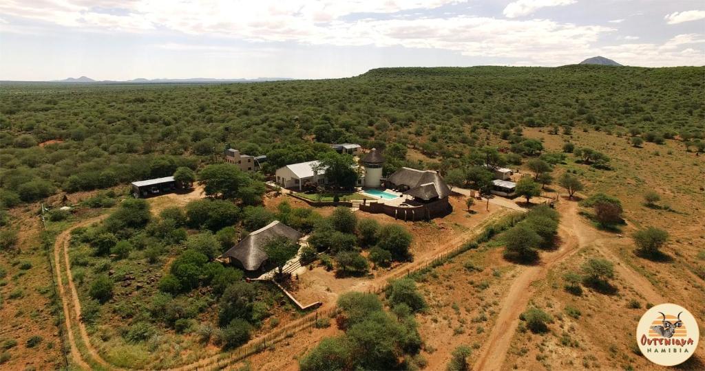 an aerial view of a house in the middle of a field at Outeniqua Guest & Hunting Farm in Okahandja