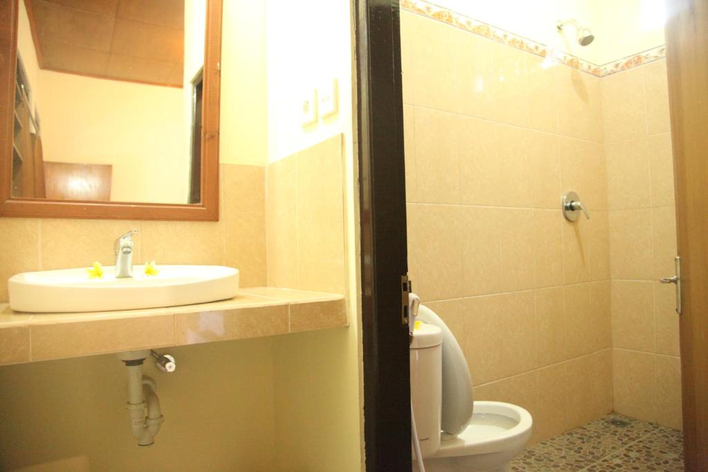 Koupelna v ubytování Damuh Guest House