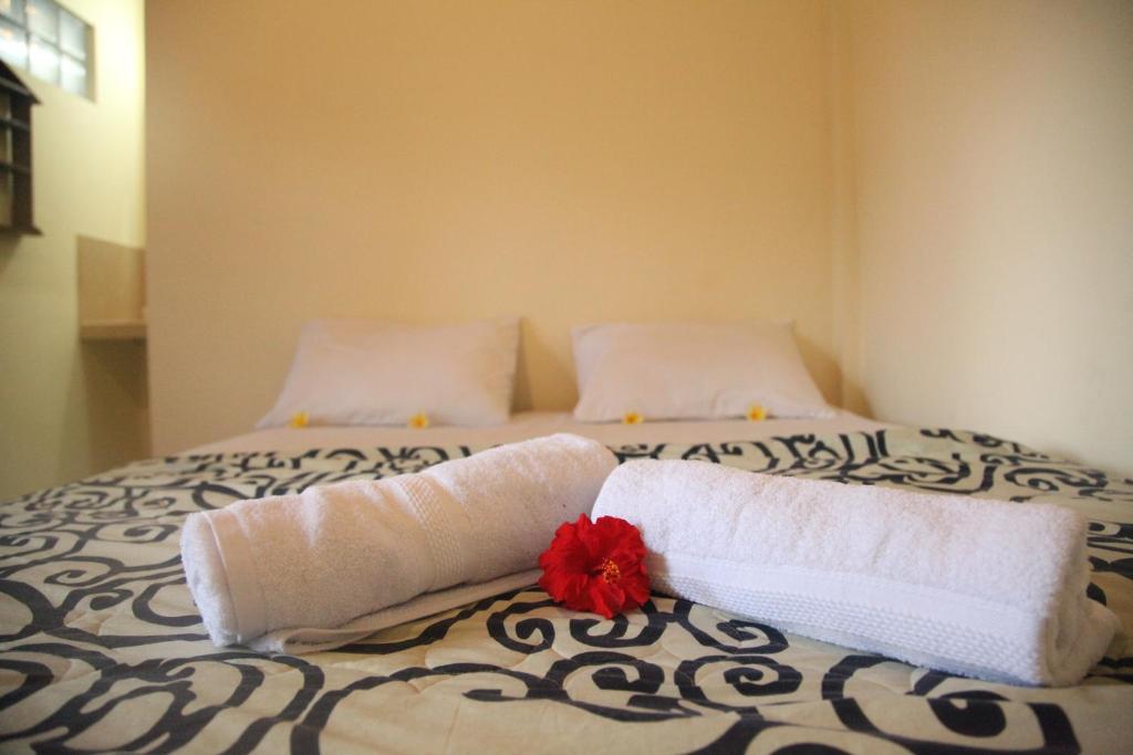 Postel nebo postele na pokoji v ubytování Damuh Guest House