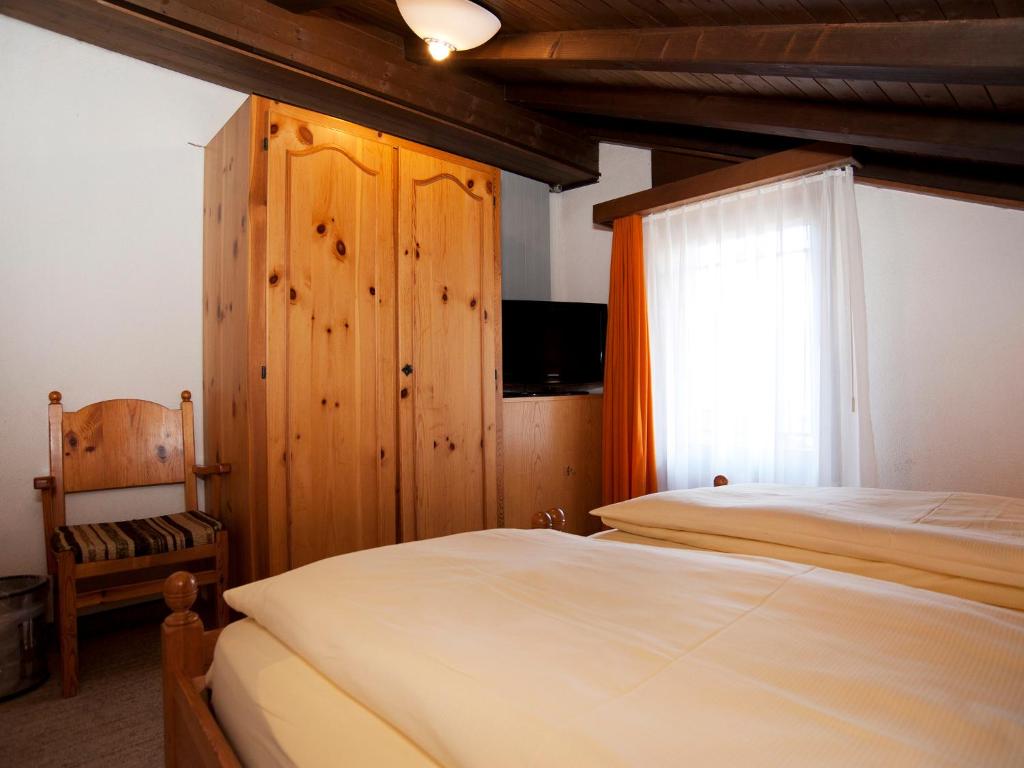 Postel nebo postele na pokoji v ubytování Ambiente Guesthouse