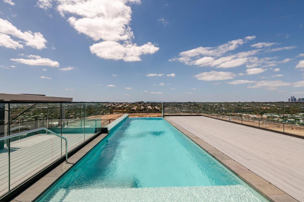 a swimming pool on the roof of a building at Winx Trackside Moonee Ponds in Moonee Ponds