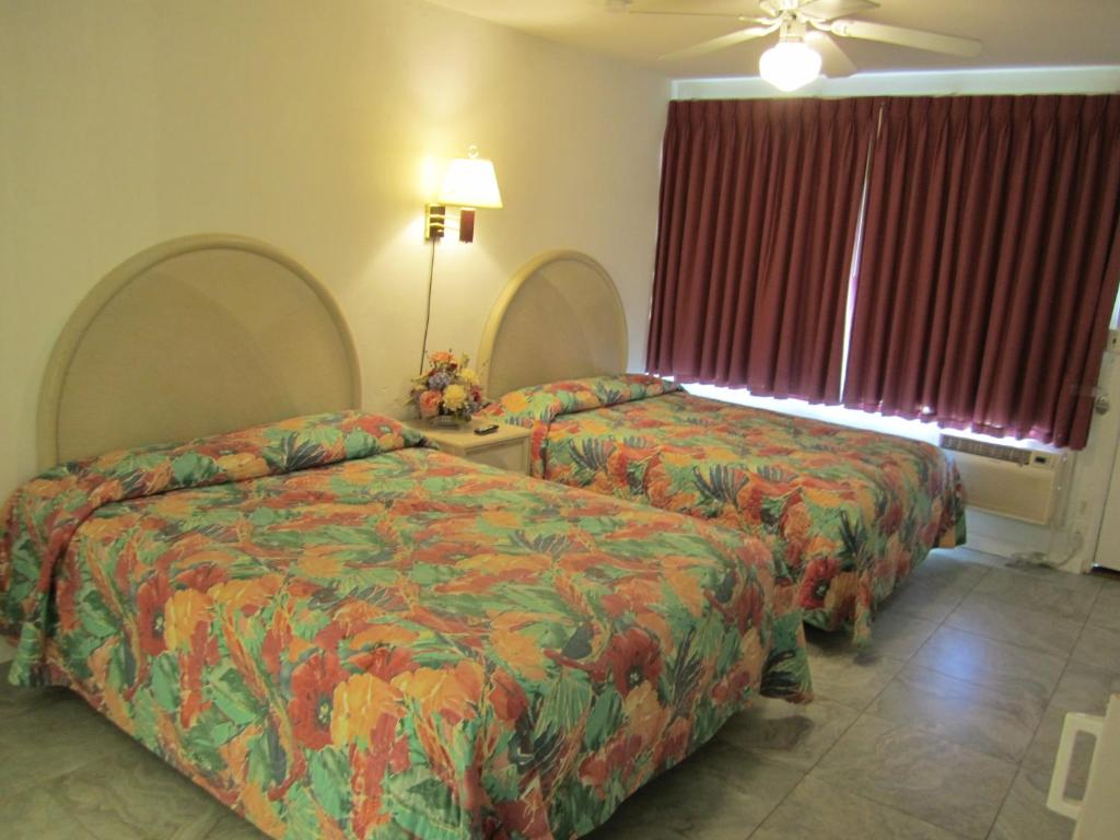 Postel nebo postele na pokoji v ubytování Apollo Motel