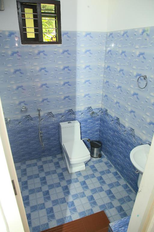 Koupelna v ubytování Marari Neena Beach homestay