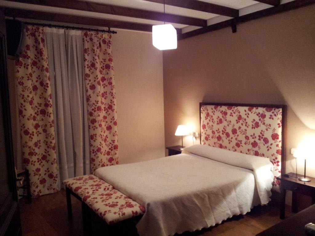Postel nebo postele na pokoji v ubytování Apartamentos El Mirador Del Soto