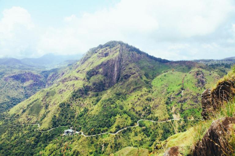 a view of a mountain with a road on it at oasis in Ella