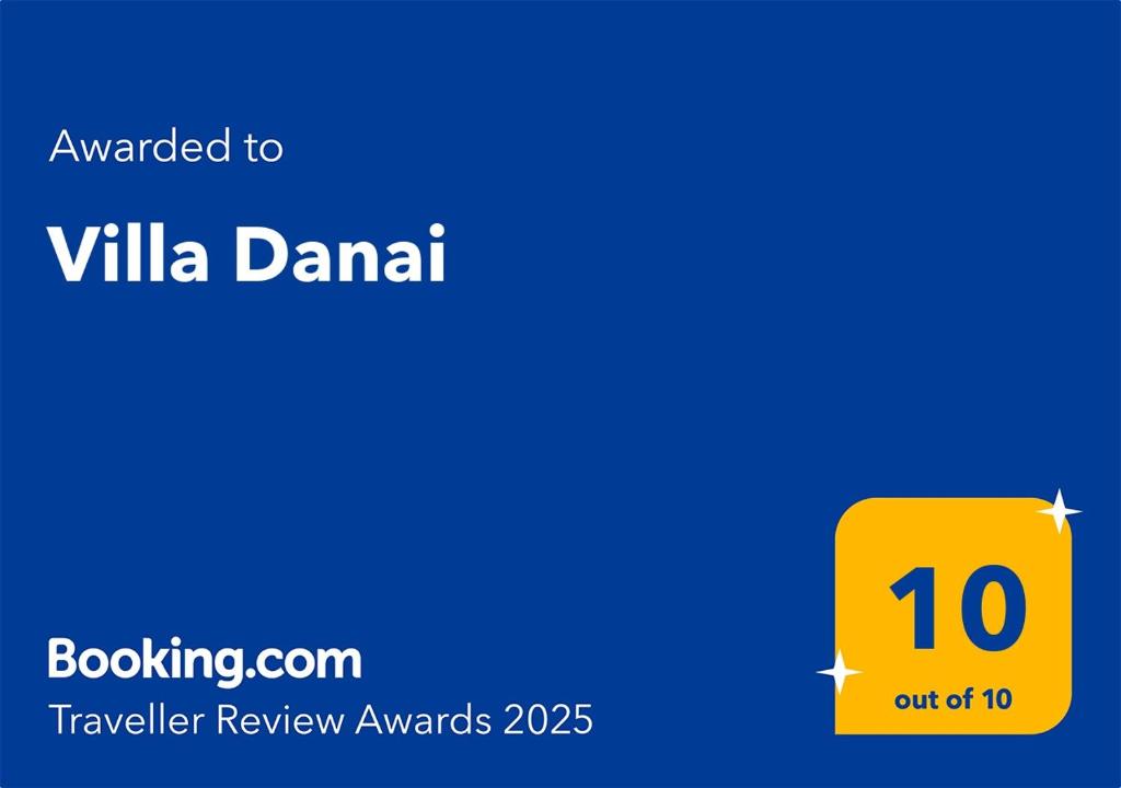a yellow box with the words translated to ville dana dana travel review at Villa Danai in Gouvia