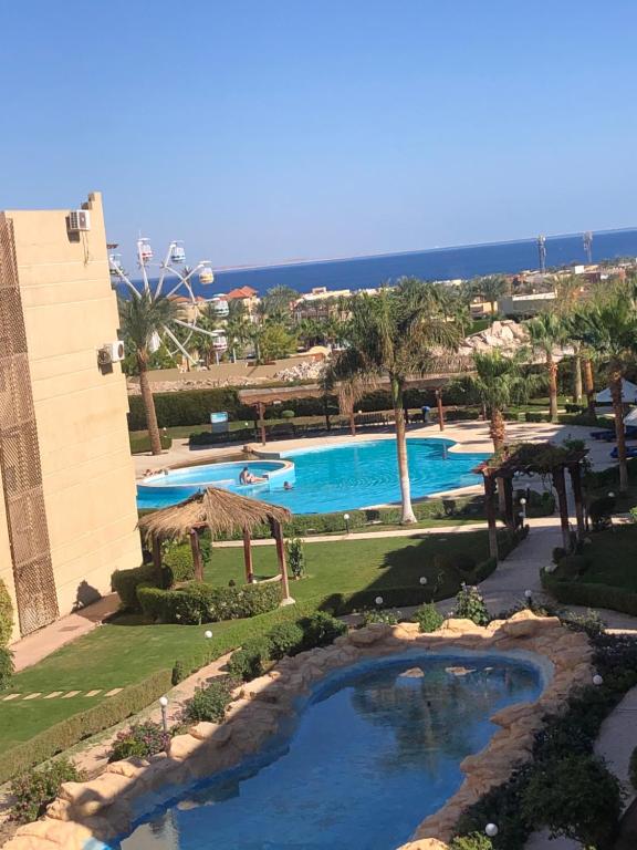 a view of a swimming pool at a resort at The view resort nabq in Sharm El Sheikh