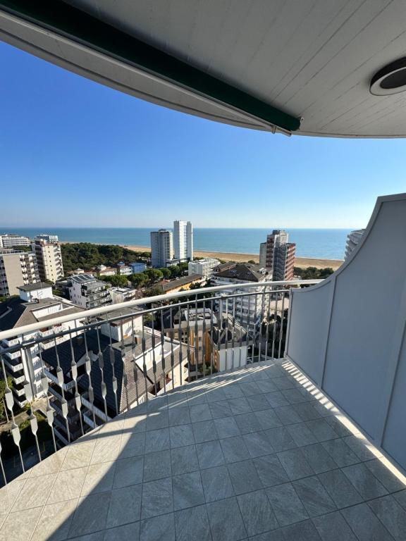 a balcony with a view of the ocean at Torre 13F SeaView Studio in Lignano Sabbiadoro