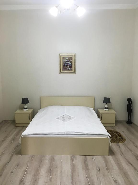 Postel nebo postele na pokoji v ubytování Batumi Summer Hotel