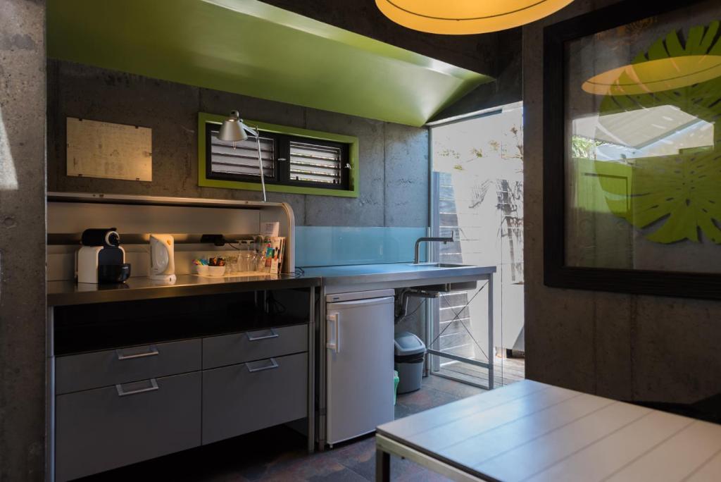 Kuchyň nebo kuchyňský kout v ubytování Villa Lodge 4 Epices
