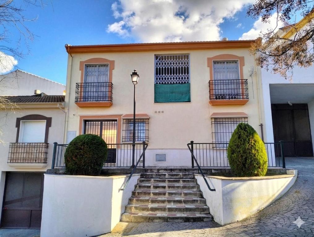 a house with stairs in front of it at Studio Nova in Priego de Córdoba