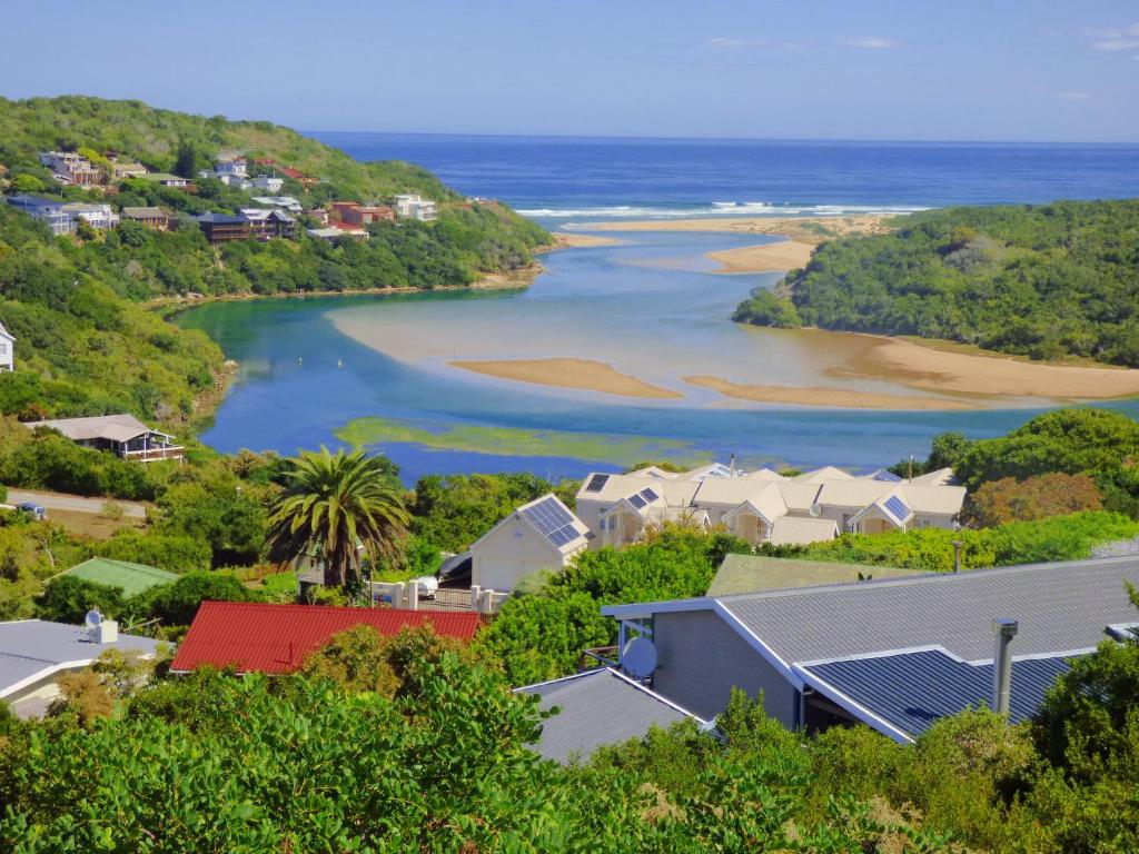 an aerial view of a town with a river and houses at Cormorants' View Self Catering accommodation in Sedgefield