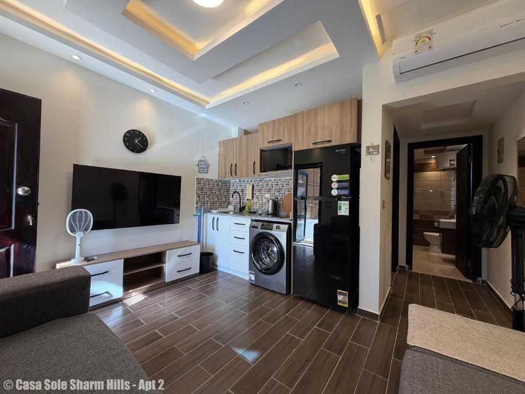 a large living room with a washer and dryer at Casa Sole Sharm Hills Apt 2 in Sharm El Sheikh
