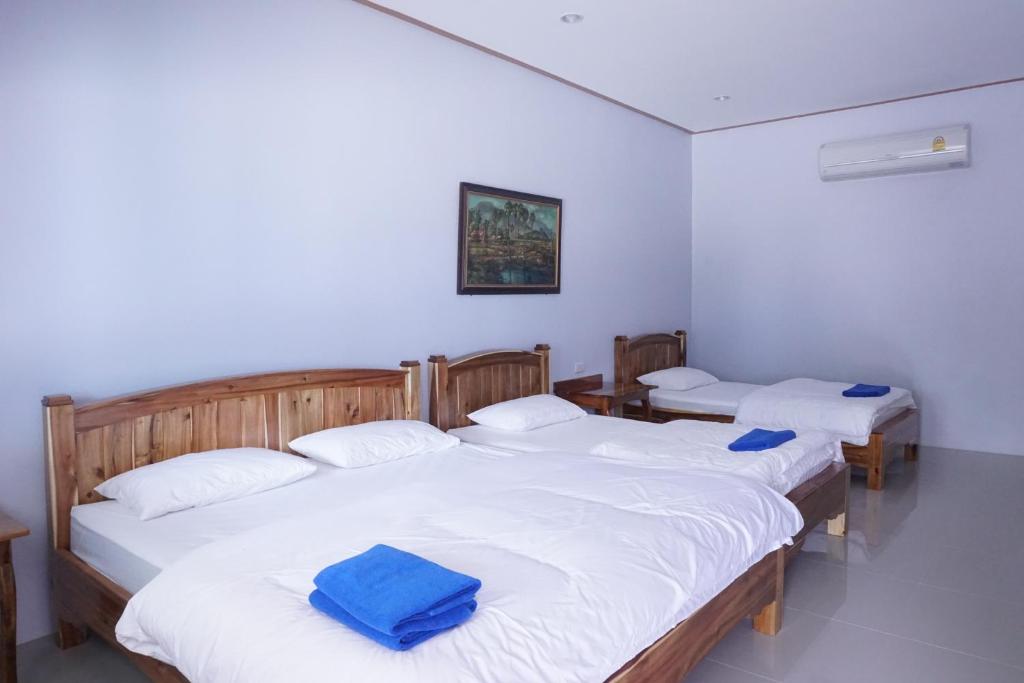 Postel nebo postele na pokoji v ubytování Anyamanee Resort Trat