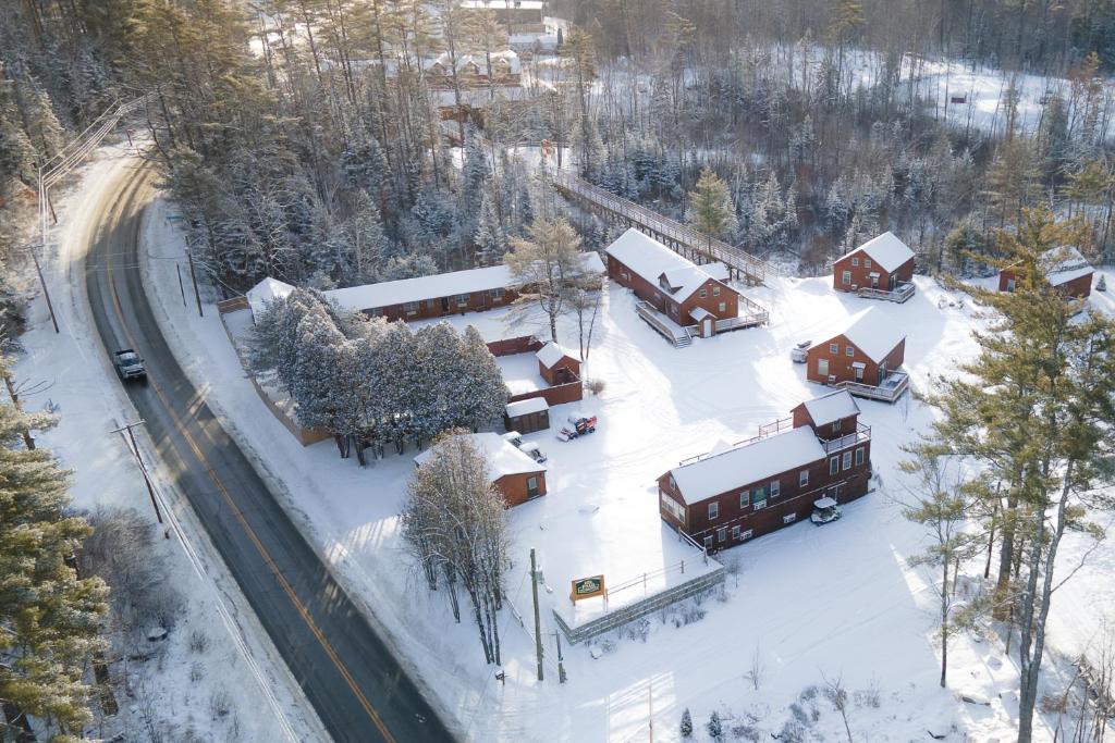 an aerial view of a house covered in snow at Presidential Mountain Resort in Bethlehem