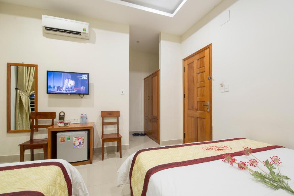 TV a/nebo společenská místnost v ubytování Dam Tien Hotel