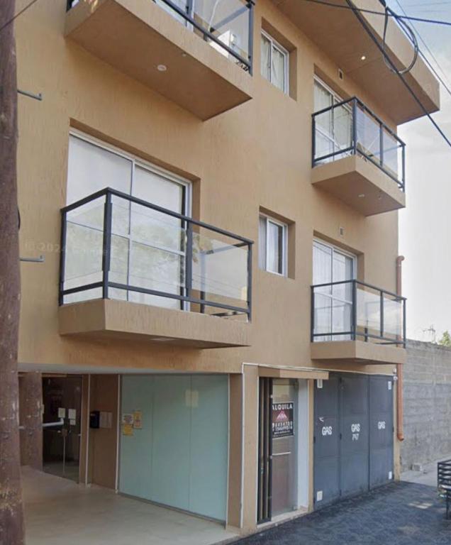 a building with balconies on the side of it at Edificio LUMARO in San Fernando del Valle de Catamarca