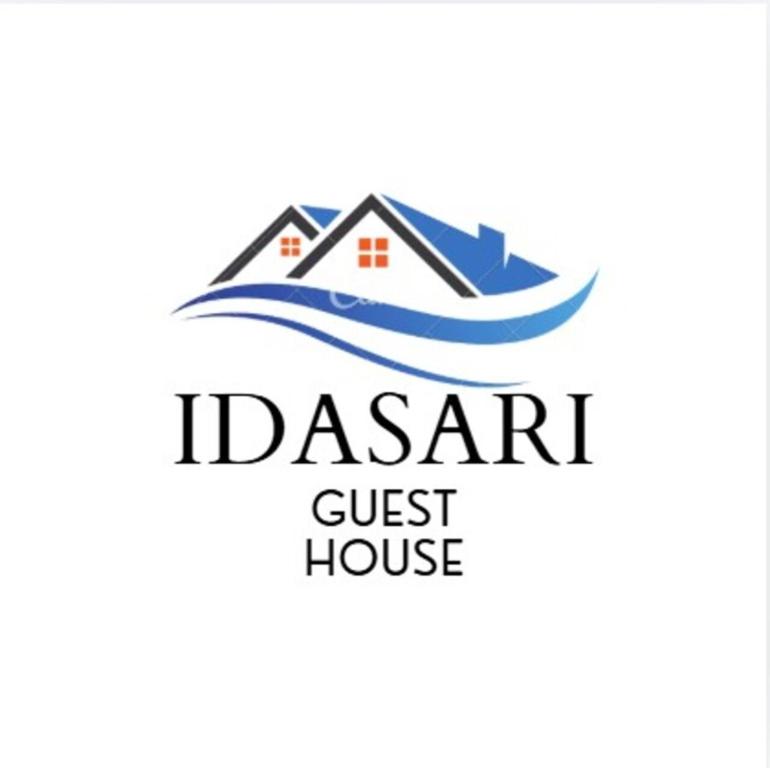 a house on the water logo at IdaSari Guest House Bukit Bunga in Kampong Bukit Bunga