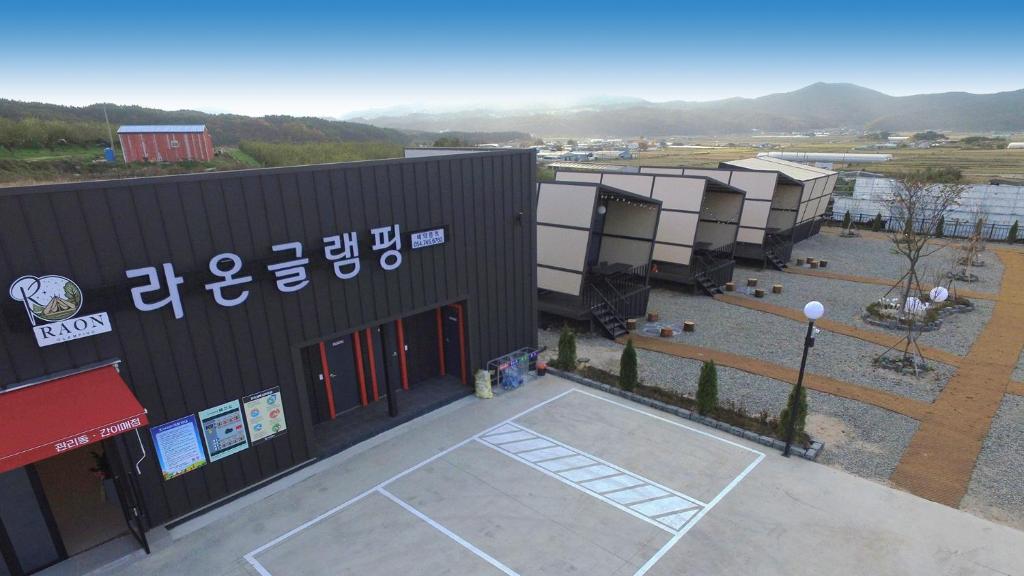 an overhead view of a building with a basketball court at Gyeongju raon glamping in Samgong