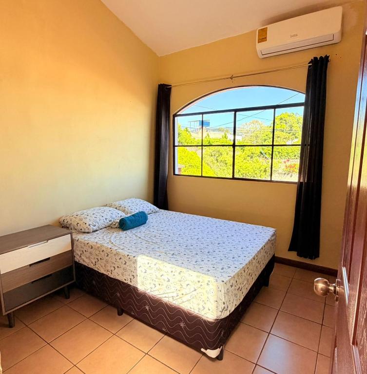 Postel nebo postele na pokoji v ubytování casa en la Cima