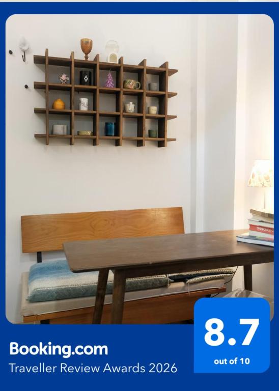 a wooden table in a room with a desk at FFC sweet home on Shaanxi Road in Shanghai