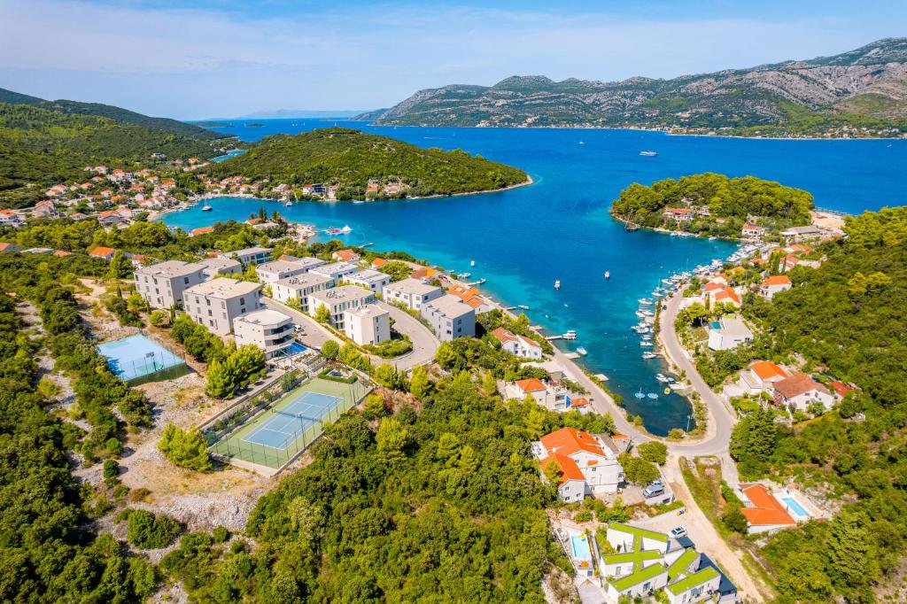 an aerial view of a resort and a lake at Korcula Hill in Korčula