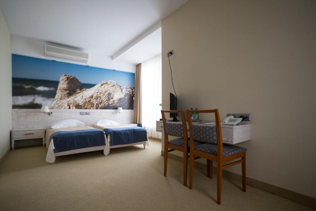 Postel nebo postele na pokoji v ubytování Hotel Morski