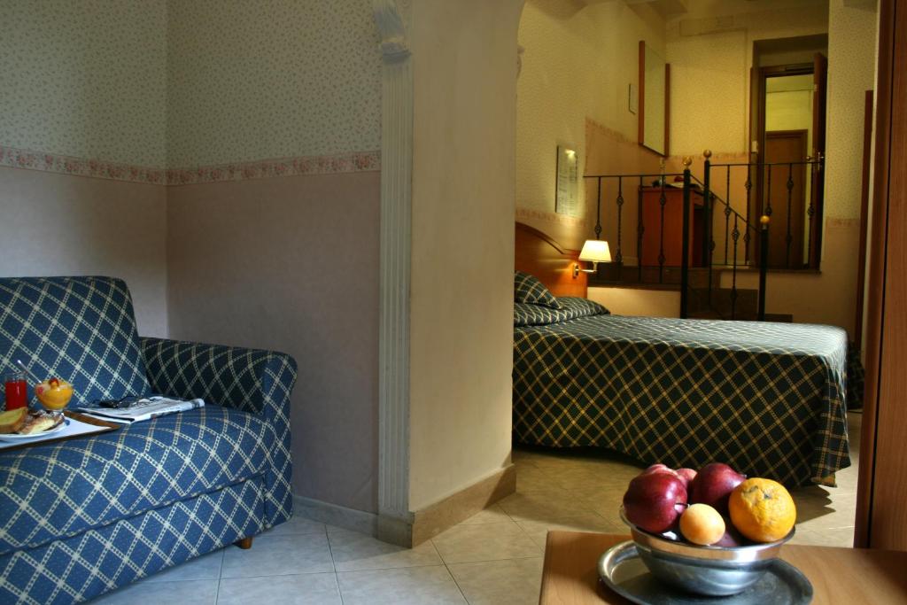 Uma área de estar em Hotel Delle Muse