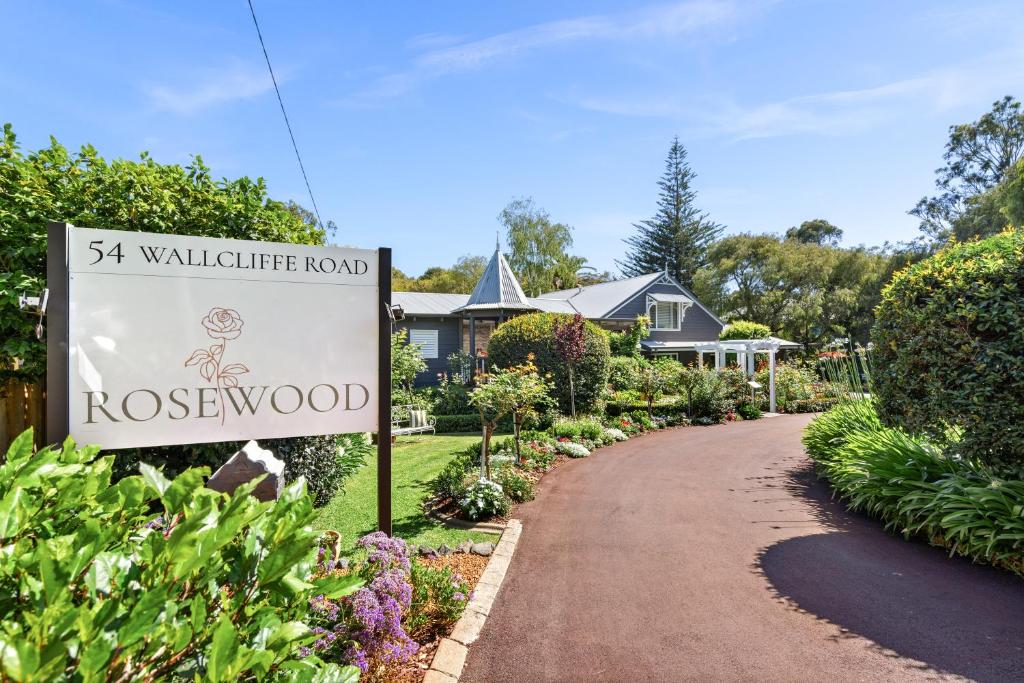 a sign in front of a house at Rosewood Guesthouse in Margaret River Town