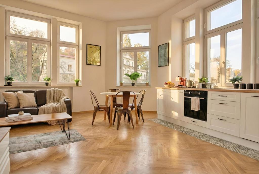 a living room with a couch and a table at Apartament na Granicy 6 in Cieszyn