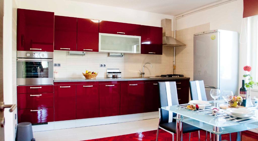 Kuchyňa alebo kuchynka v ubytovaní Apartman Šestine