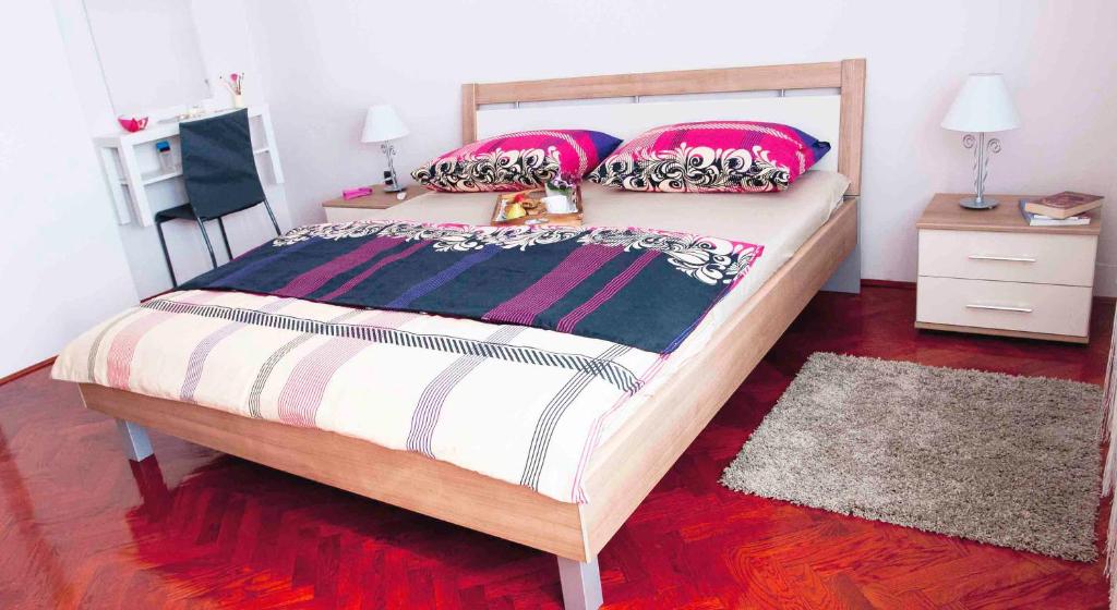 Posteľ alebo postele v izbe v ubytovaní Apartman Šestine