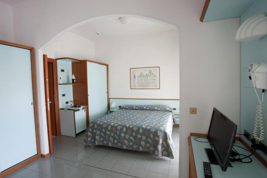 Postel nebo postele na pokoji v ubytování Hotel Gaby