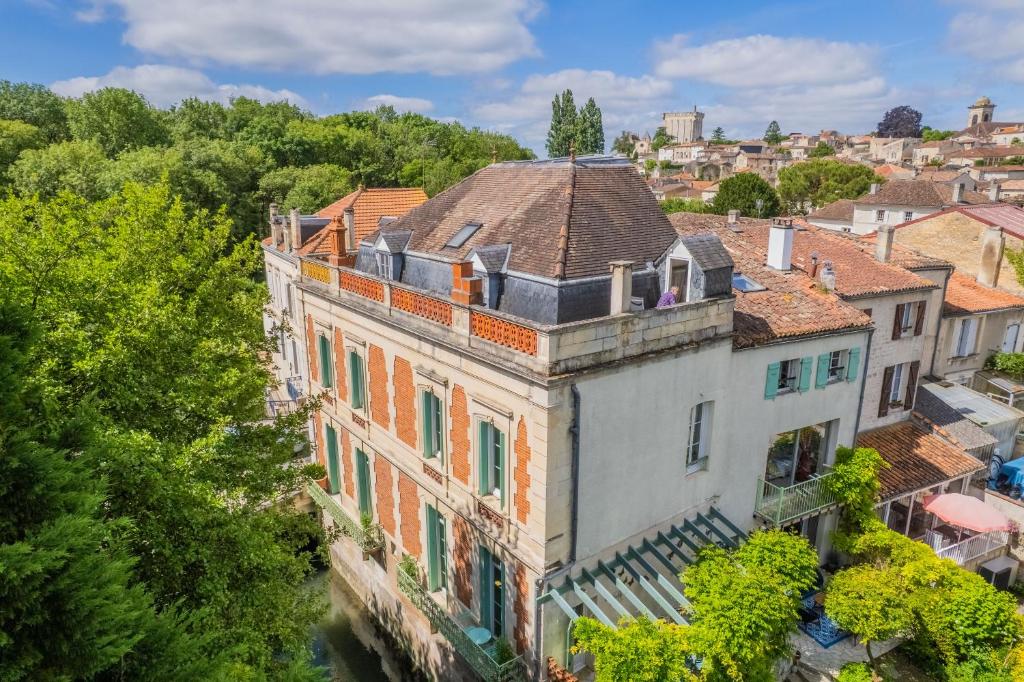 an aerial view of a building in a city at Beautiful large stylish villa centrally located in Pons in Pons