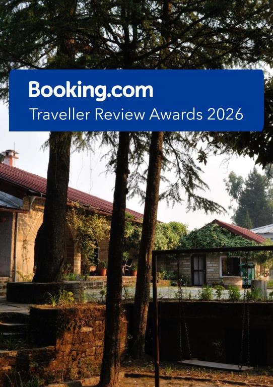 a review of a travel review awards in front of a house at Khali Estate in Binsar