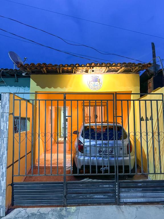 a car parked in the front of a house at Ksa Sodré in Barreirinhas