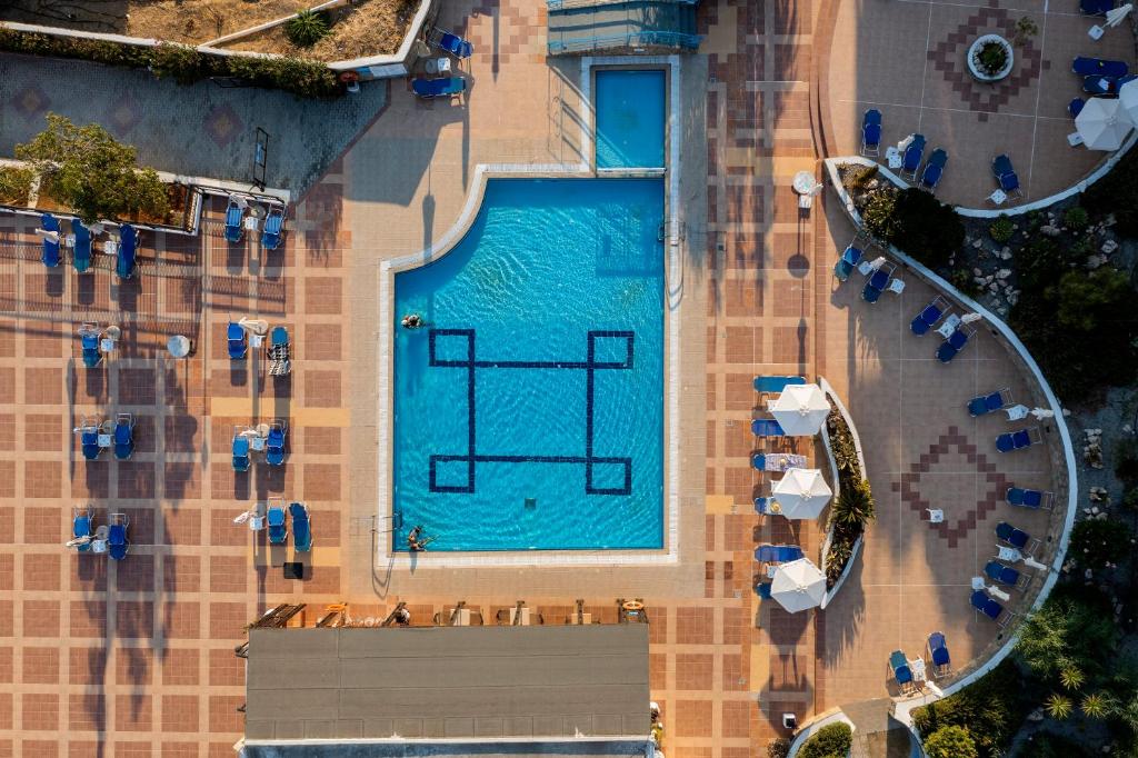 an overhead view of a swimming pool at a resort at Stella Hotel in Pefki