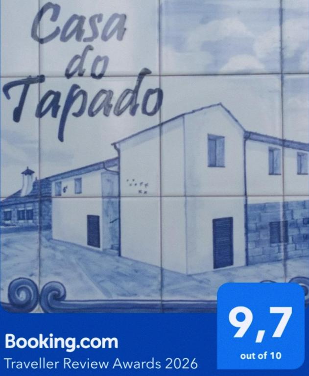 a sign that says casa do tarpapa with a building at Casa do Tapado in Amarante