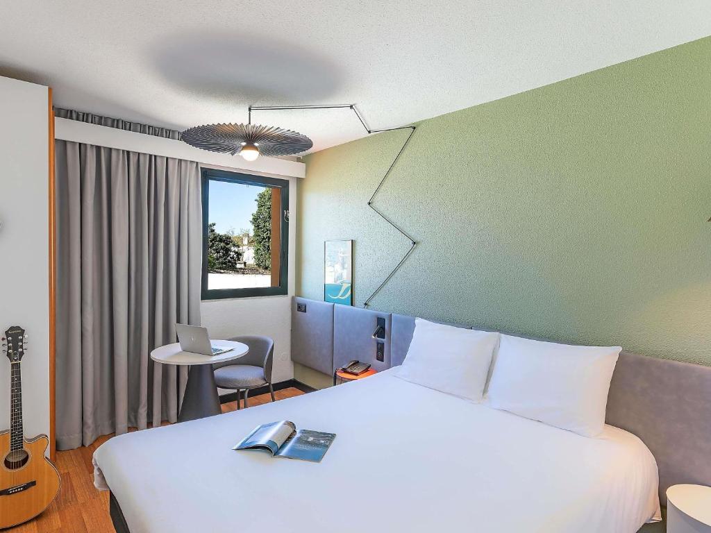 Krevet ili kreveti u jedinici u okviru objekta Hotel ibis Evora