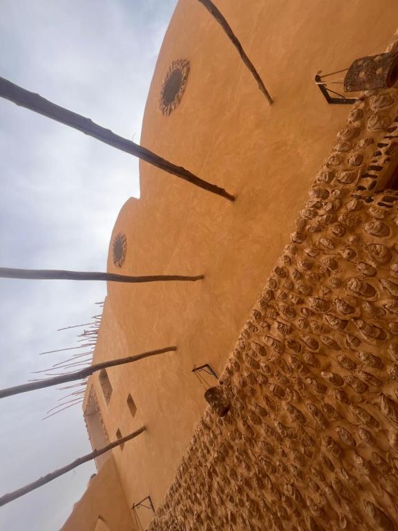 a close up of the side of a clock tower at Azru hotel siwa in Siwa